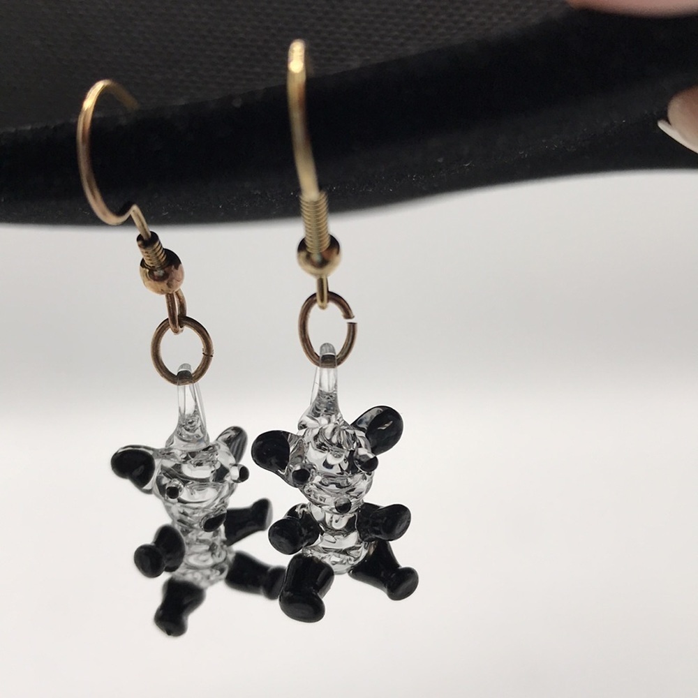 Glass-look panda earrings with gold tone ear wires